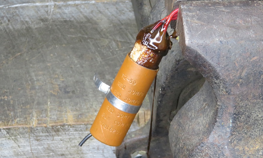 Capacitor in vise - heated